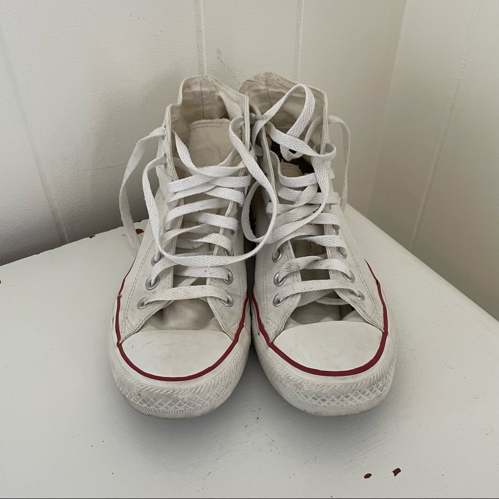 White Converse high tops
